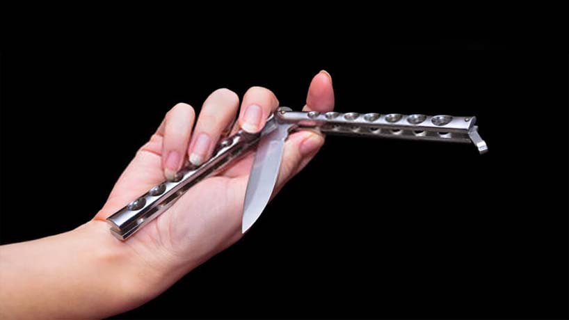 how to use a butterfly knife properly, butterfly knife tricks for beginners