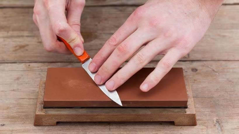how to use a whetstone to sharpen a knife, how to use a two sided whetstone
